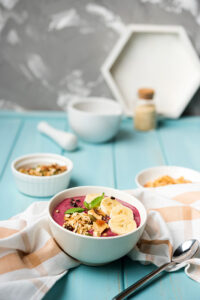 Berry Smoothie Bowl with Granola and Banana Topping