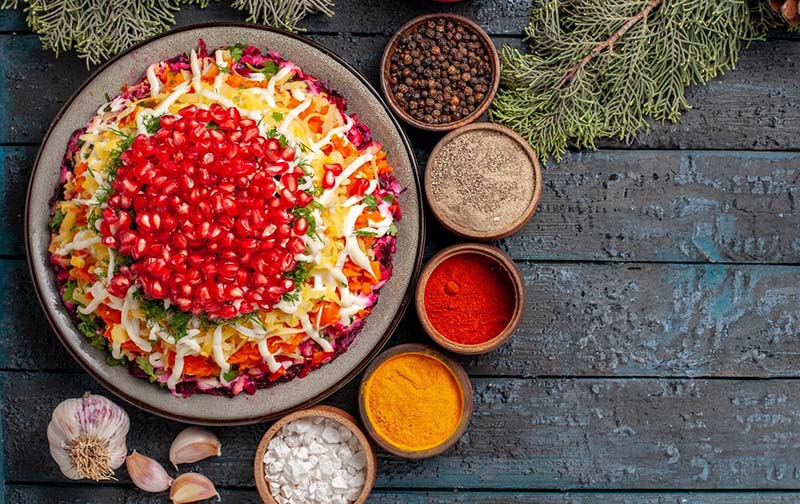 Layered Vegetable Salad with Pomegranate